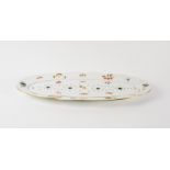 A HEREND `MARKET GARDEN' PATTERN OZIER MOULDED SHAPED OVAL FISH PLATTER AND STRAINER (2)