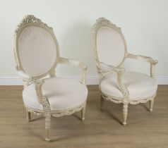 A PAIR OF CONTINENTAL PAINTED CARVED ARMCHAIRS (2)
