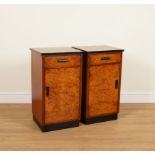 A PAIR OF ART DECO STYLE WALNUT SINGLE DRAWER BEDSIDE CUPBOARDS (2)