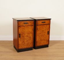 A PAIR OF ART DECO STYLE WALNUT SINGLE DRAWER BEDSIDE CUPBOARDS (2)