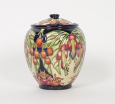 A MOORCROFT OVOID JAR AND COVER BY PHILIP GIBSON