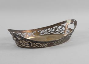 A SILVER TWIN HANDLED BREAD BASKET