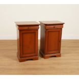 A PAIR OF STAINED BEECH SINGLE DRAWER BEDSIDE CUPBOARDS (2)