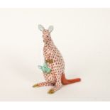 A HEREND PORCELAIN MODEL OF A RUST FISHNET KANGAROO AND GREEN YOUNG