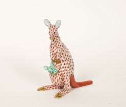 A HEREND PORCELAIN MODEL OF A RUST FISHNET KANGAROO AND GREEN YOUNG