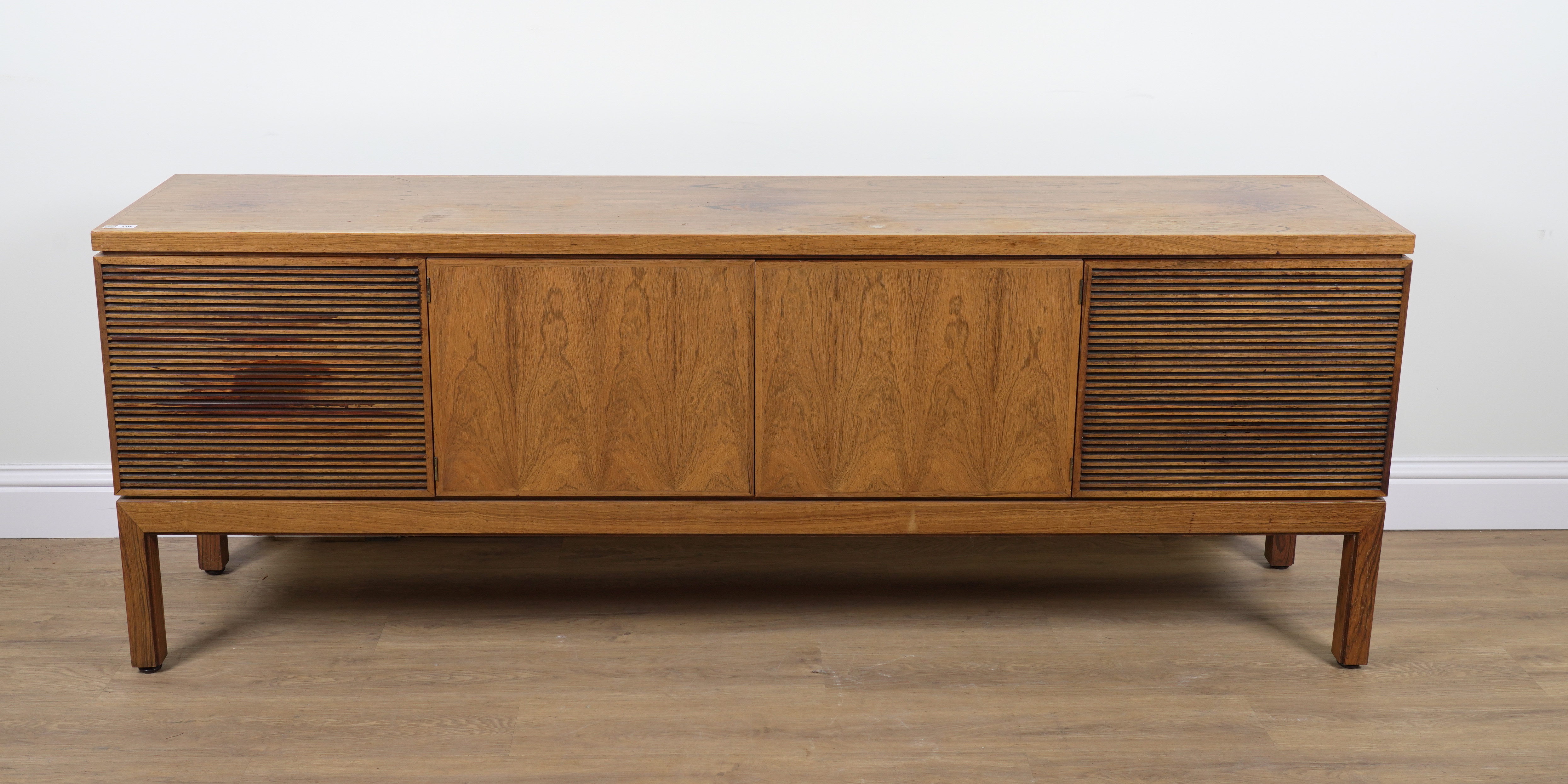 PROBABLY ARCHIE SHINE FOR HEALS FURNITURE; A MID 20TH CENTURY ROSEWOOD FOUR DOOR SIDEBOARD - Image 5 of 6