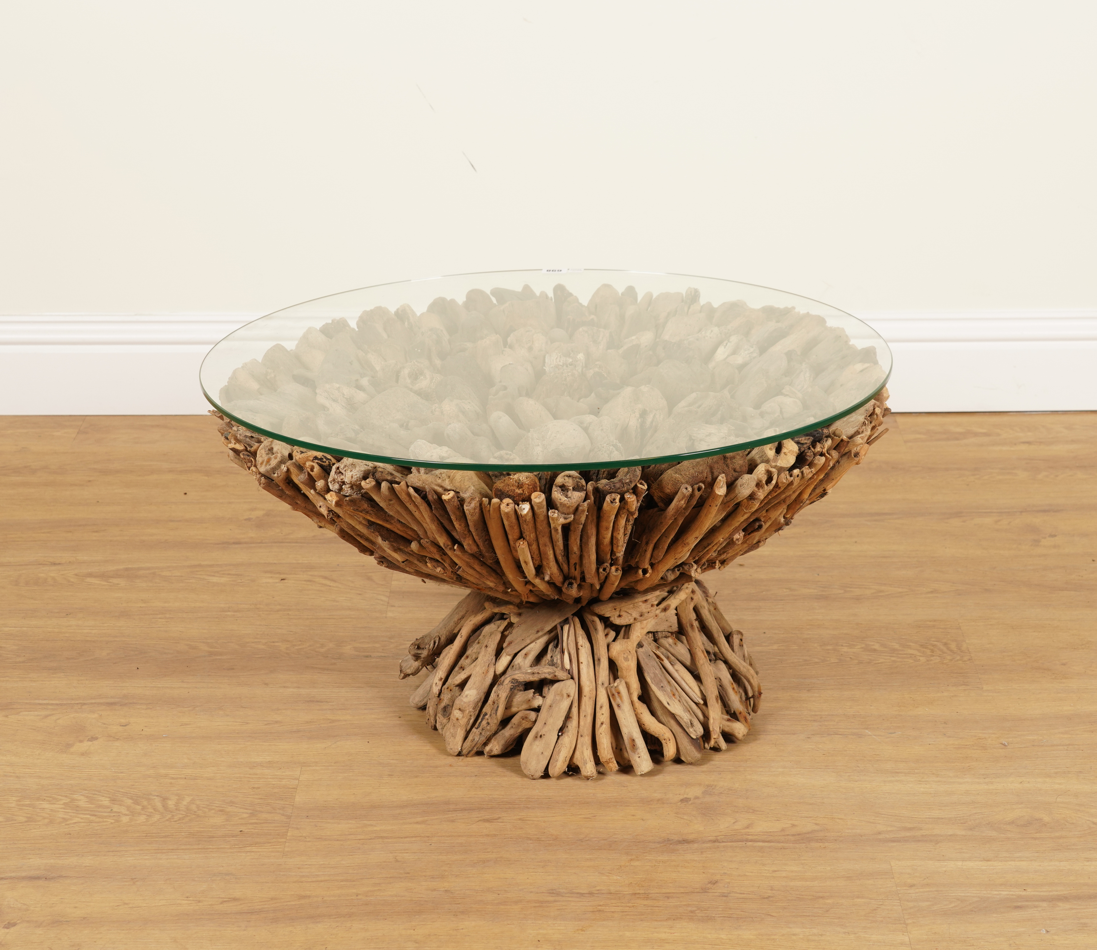 A 20TH CENTURY CIRCULAR GLASS TOPPED OCCASIONAL TABLE