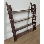 A LATE VICTORIAN MAHOGANY FOUR TIER HANGING SHELF