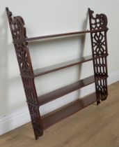 A LATE VICTORIAN MAHOGANY FOUR TIER HANGING SHELF