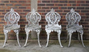 A SET OF FOUR WHITE PAINTED CAST ALUMINIUM GARDEN CHAIRS (4)