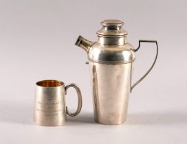 A SILVER MUG AND A PLATED COCKTAIL SHAKER (2)