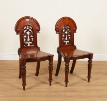 A PAIR OF VICTORIAN MAHOGANY HALL CHAIRS (2)