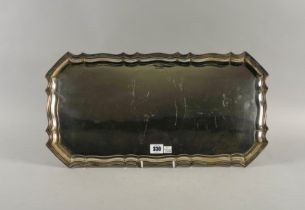 A SILVER SHAPED RECTANGULAR TRAY