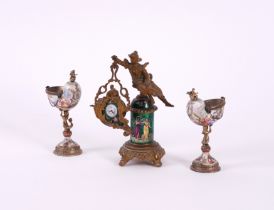A PAIR OF VIENNESE ENAMEL NAUTILUS SALTS AND A FRENCH GILT AND ENAMEL DECORATED TIME-PIECE (3)