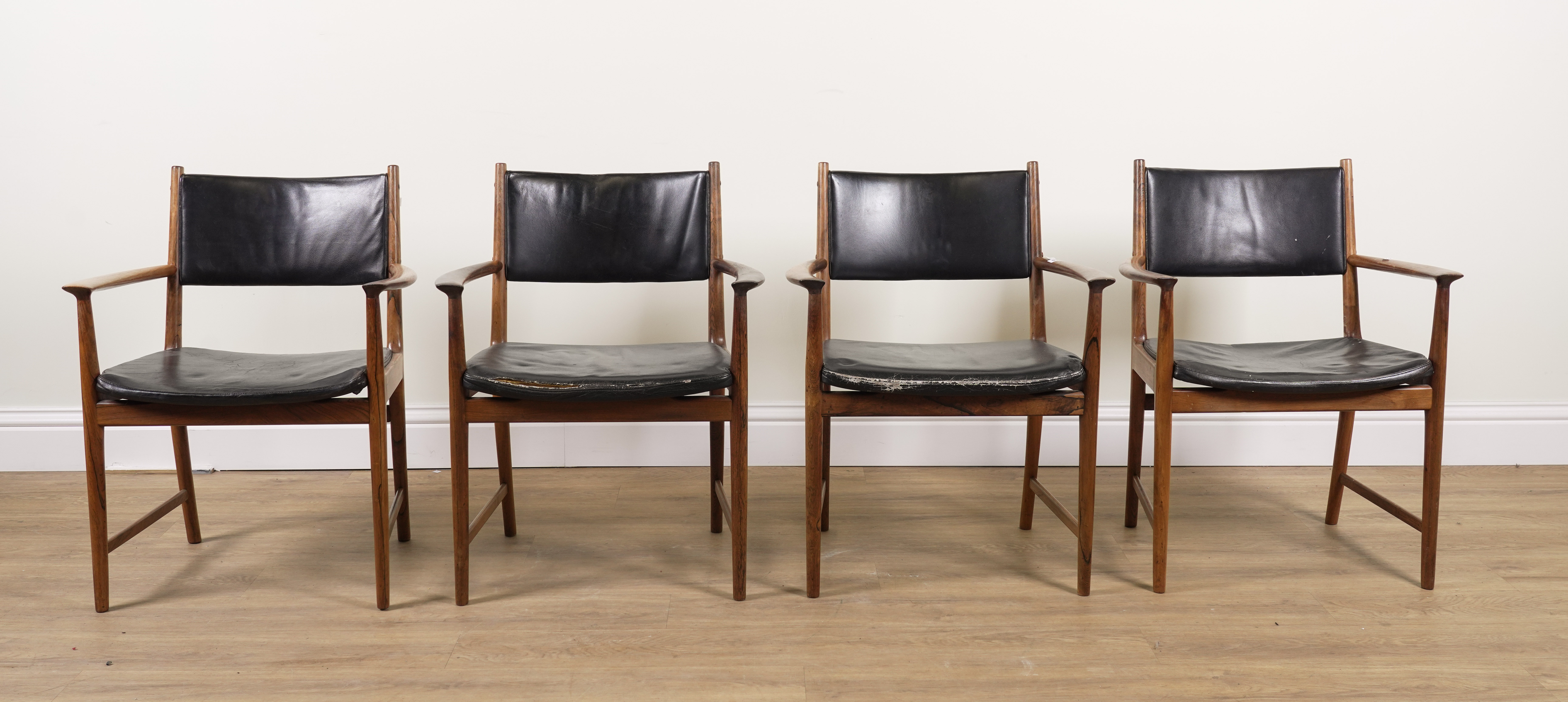 PROBABLY ARCHIE SHINE FOR HEALS FURNITURE; A SET OF FOUR MID-20TH CENTURY ROSEWOOD OPEN...