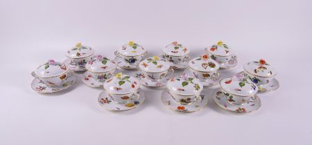 A SET OF TWELVE HEREND `MARKET GARDEN' PATTERN OZIER MOULDED SOUP CUPS, COVERS AND STANDS (36)