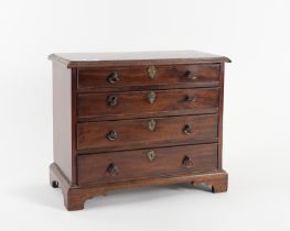 A GEORE III MINIATURE MAHOGANY FOUR DRAWER CHEST (2)