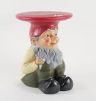 STARCK FOR CARTELL; PAINTED PLASTIC STOOL MODELLED AS A SEATED GNOME