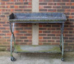 A MODERN RIVETED METAL GARDEN/ POTTING SHED TABLE