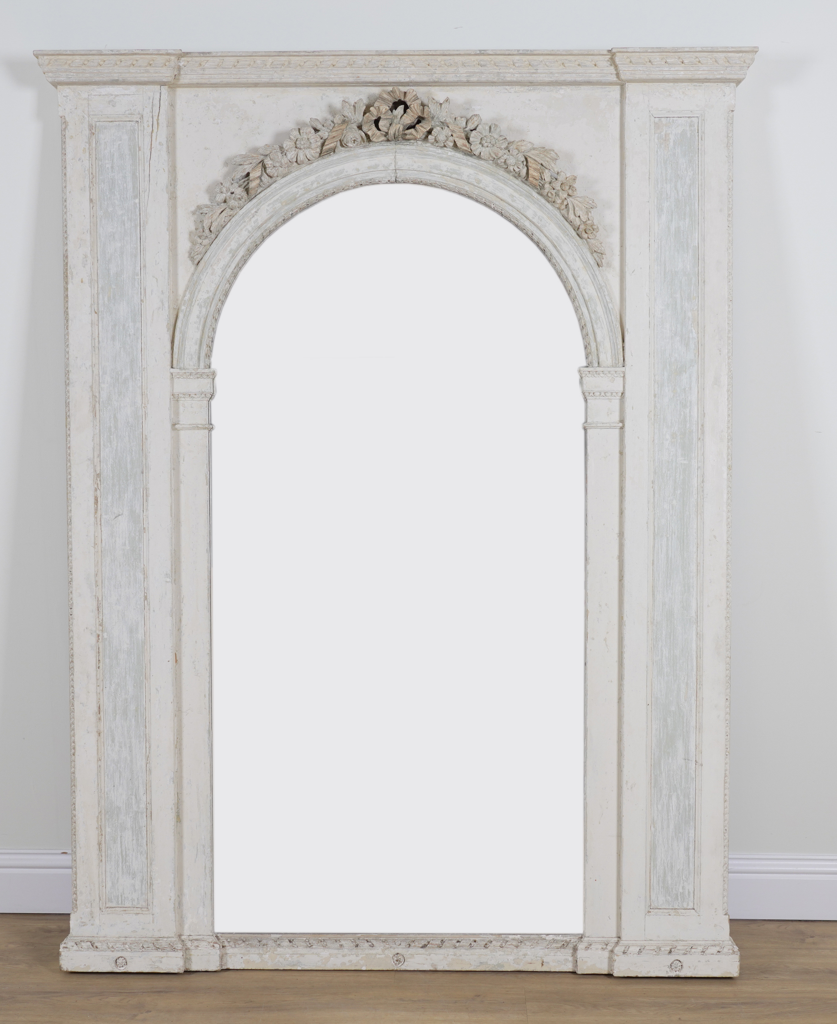 A LARGE 19TH CENTURY ARCH TOP MIRROR
