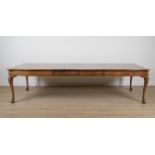 A GEORGE II STYLE WALNUT EXTENDING DINING TABLE