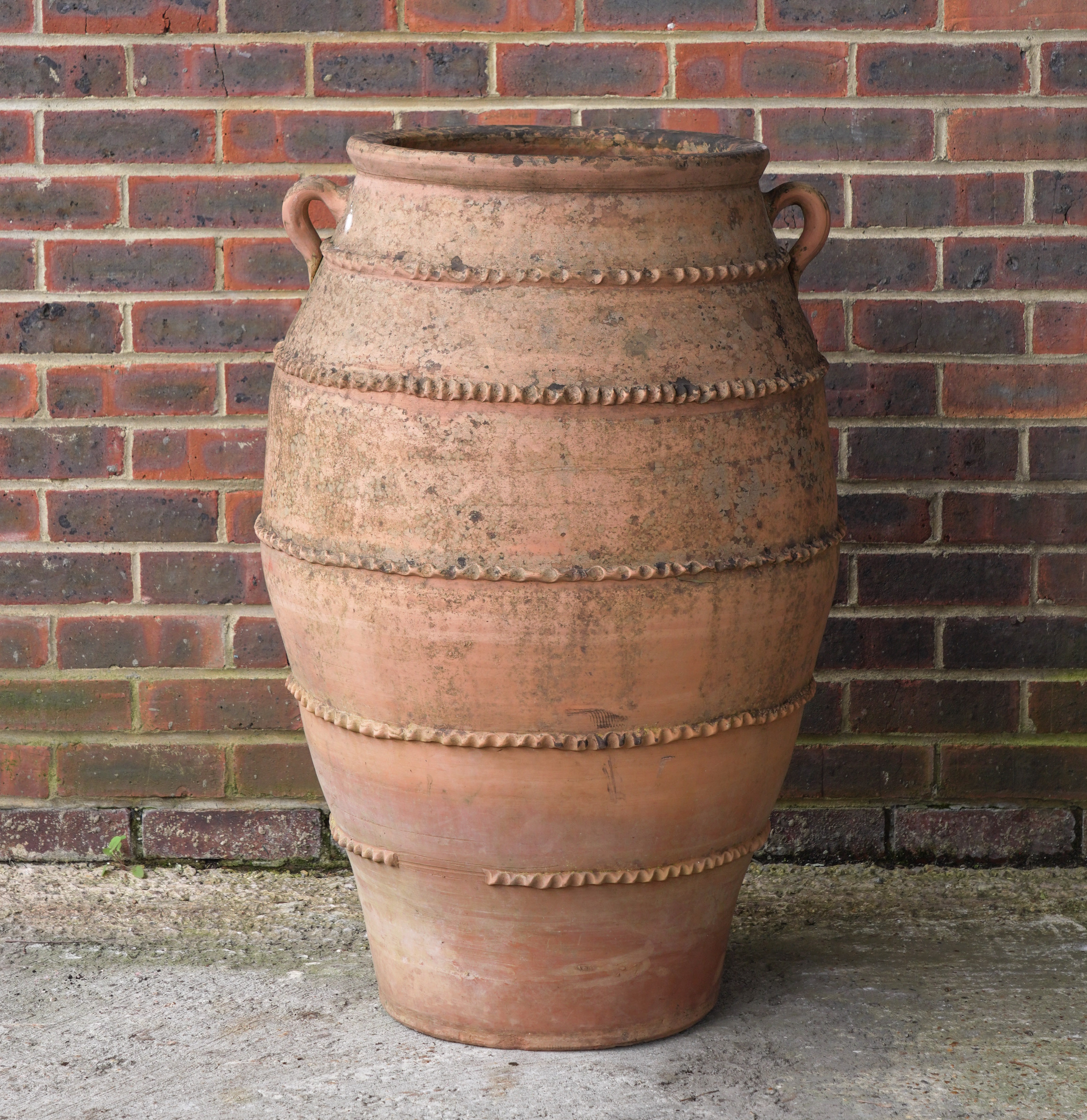 A TERRACOTTA OIL JAR