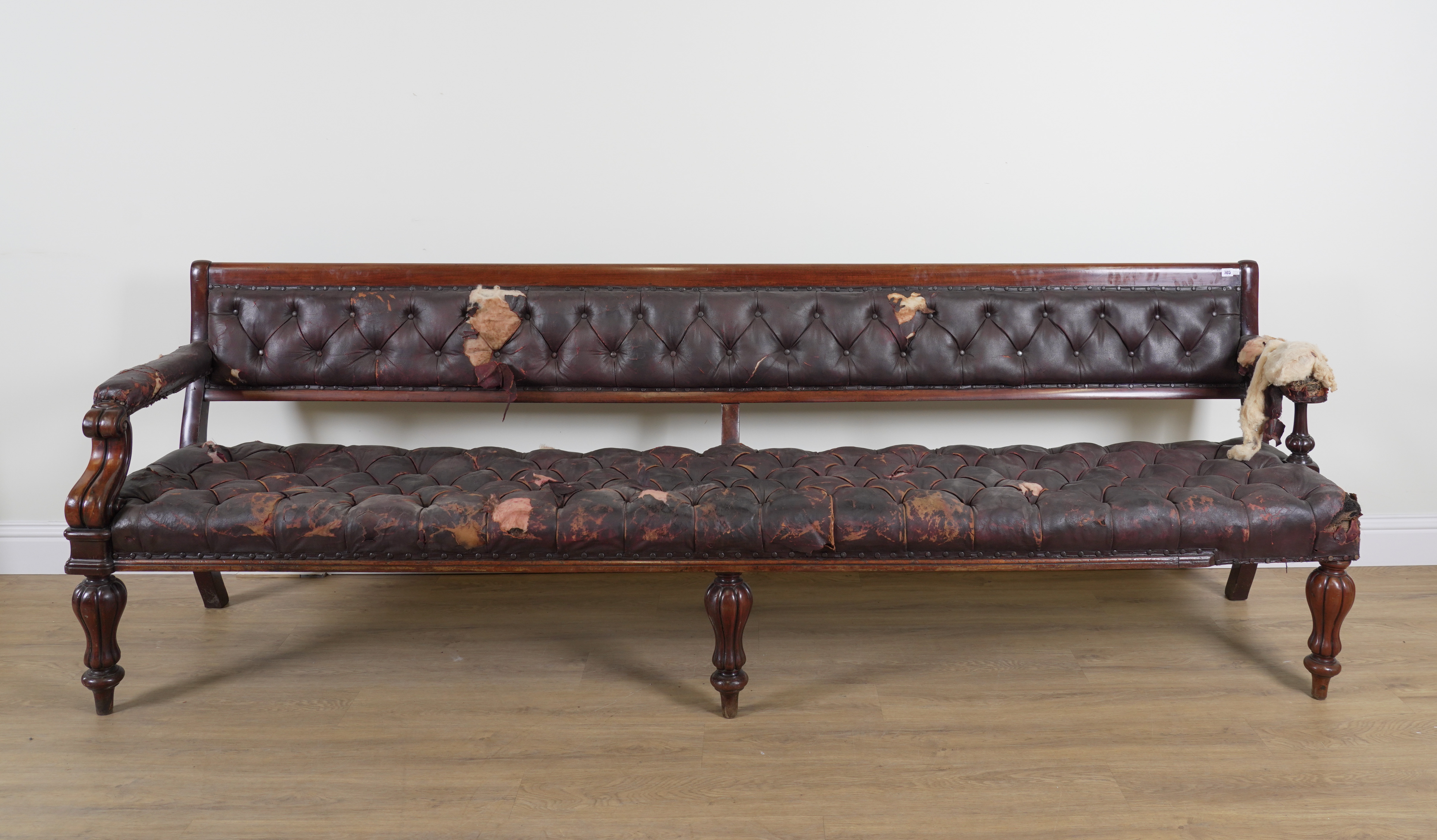 A LARGE MID 19TH CENTURY MAHOGANY FRAMED OPEN ARM BENCH