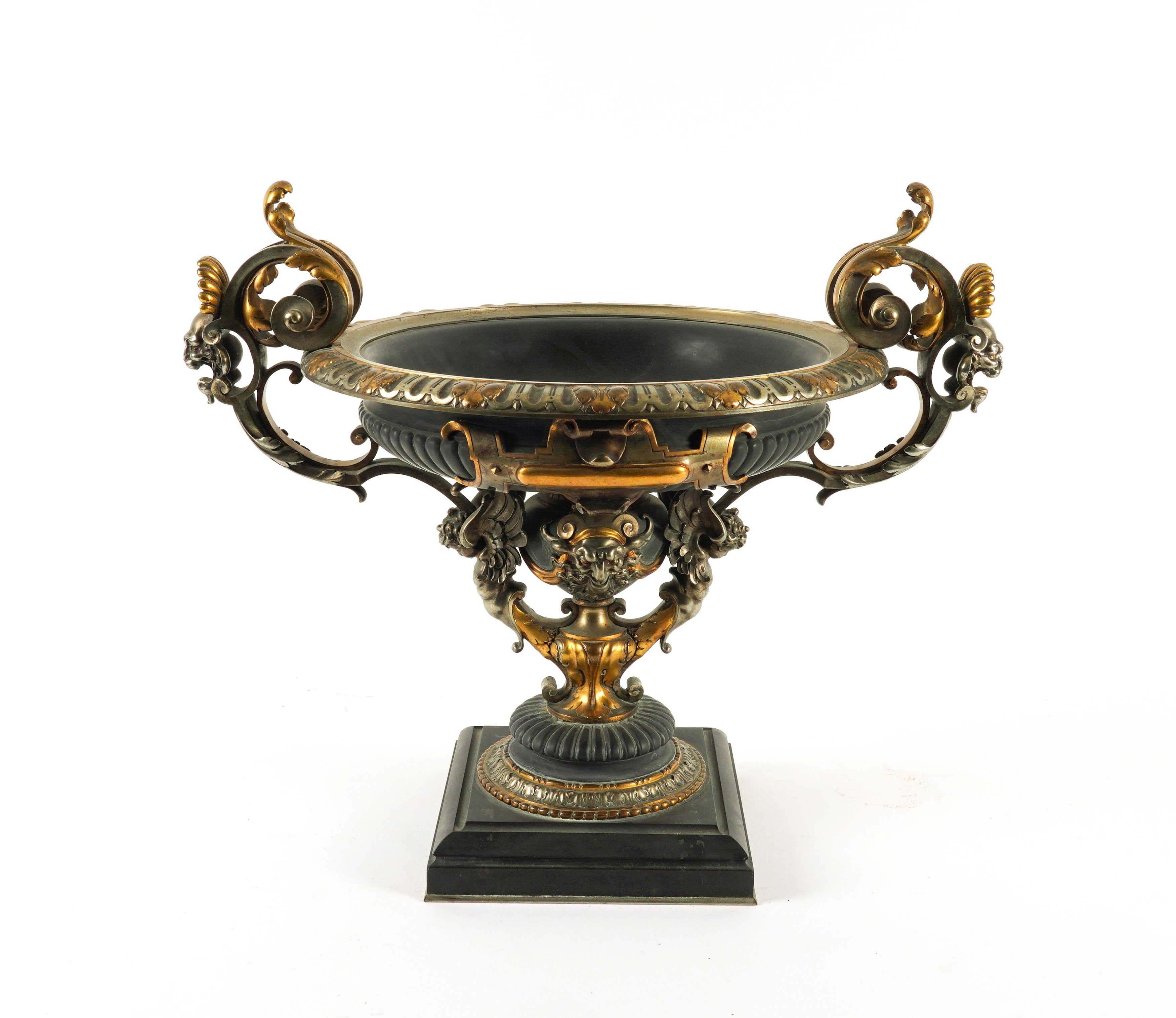 FERDINAND BARBEDIENNE, PARIS: A FRENCH GILT AND SILVERED BRONZE TWIN HANDLED TAZZA