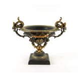 FERDINAND BARBEDIENNE, PARIS: A FRENCH GILT AND SILVERED BRONZE TWIN HANDLED TAZZA