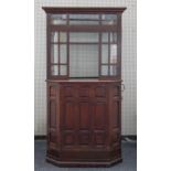 A STAINED PANELLED OAK AND GLASS THEATRE BOOTH