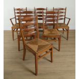 A SET OF SIX MID 20TH CENTURY OAK AND YEW WOOD PIERCED LADDER BACK DINING CHAIRS (6)