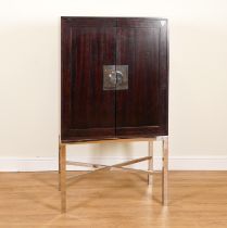 A TALL HARDWOOD TWO DOOR SIDE CABINET