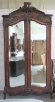 A LATE 19TH CENTURY FRENCH ROSEWOOD ARMOIRE WITH A PAIR OF BEVELLED MIRRORED DOORS