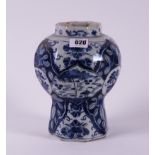AN OCTAGONAL DUTCH DELFT BLUE AND WHITE CHINOISERIE VASE