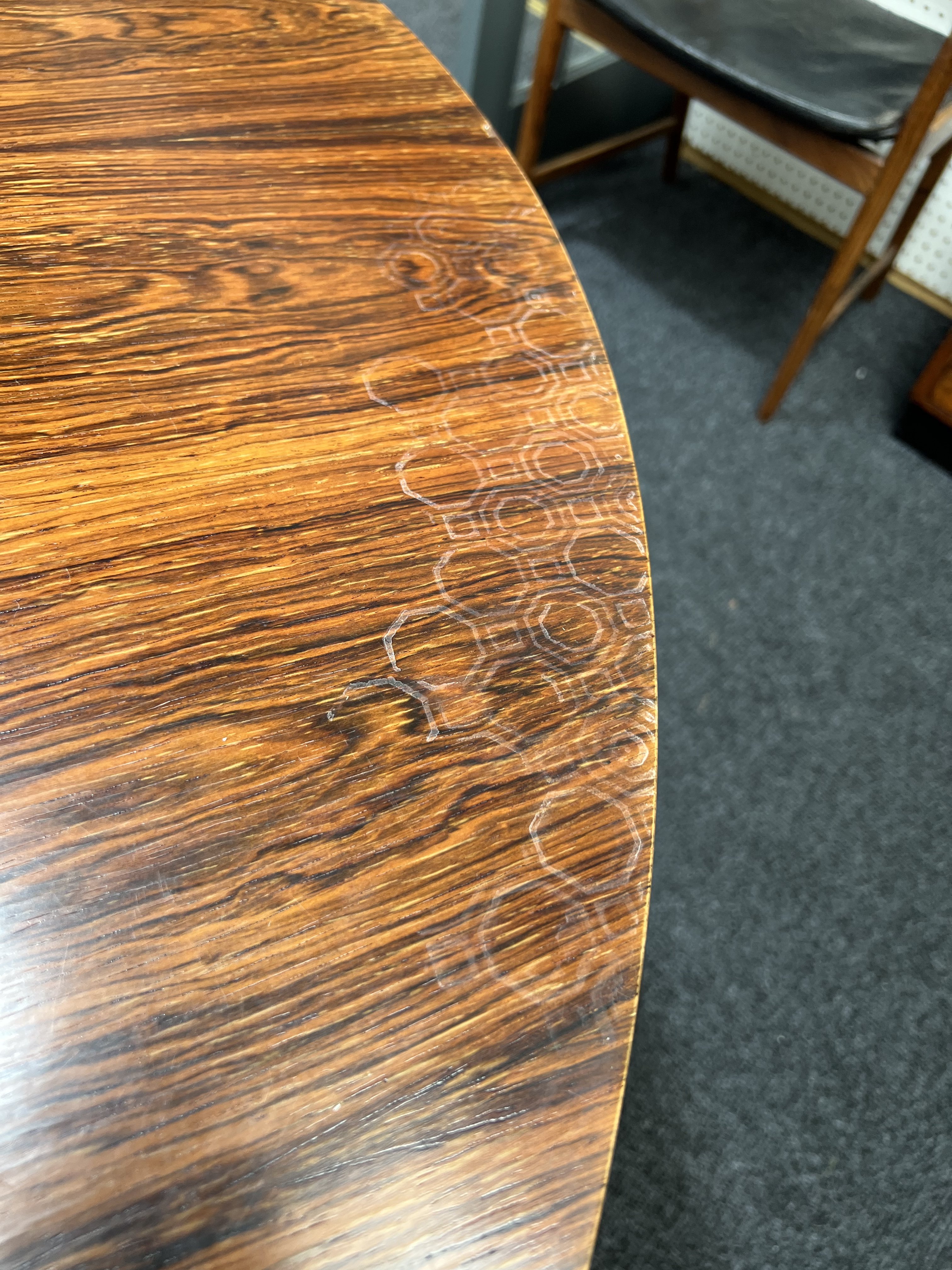 PROBABLY ARCHIE SHINE FOR HEALS FURNITURE; A MID-20TH CENTURY ROSEWOOD CIRCULAR DINING TABLE - Image 8 of 11