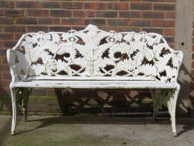 A COALBROOKDALE STYLE CAST IRON FERN AND BERRY PATTERN GARDEN BENCH