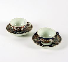 A WORCESTER BLUE-GROUND TEACUP AND SAUCER (4)