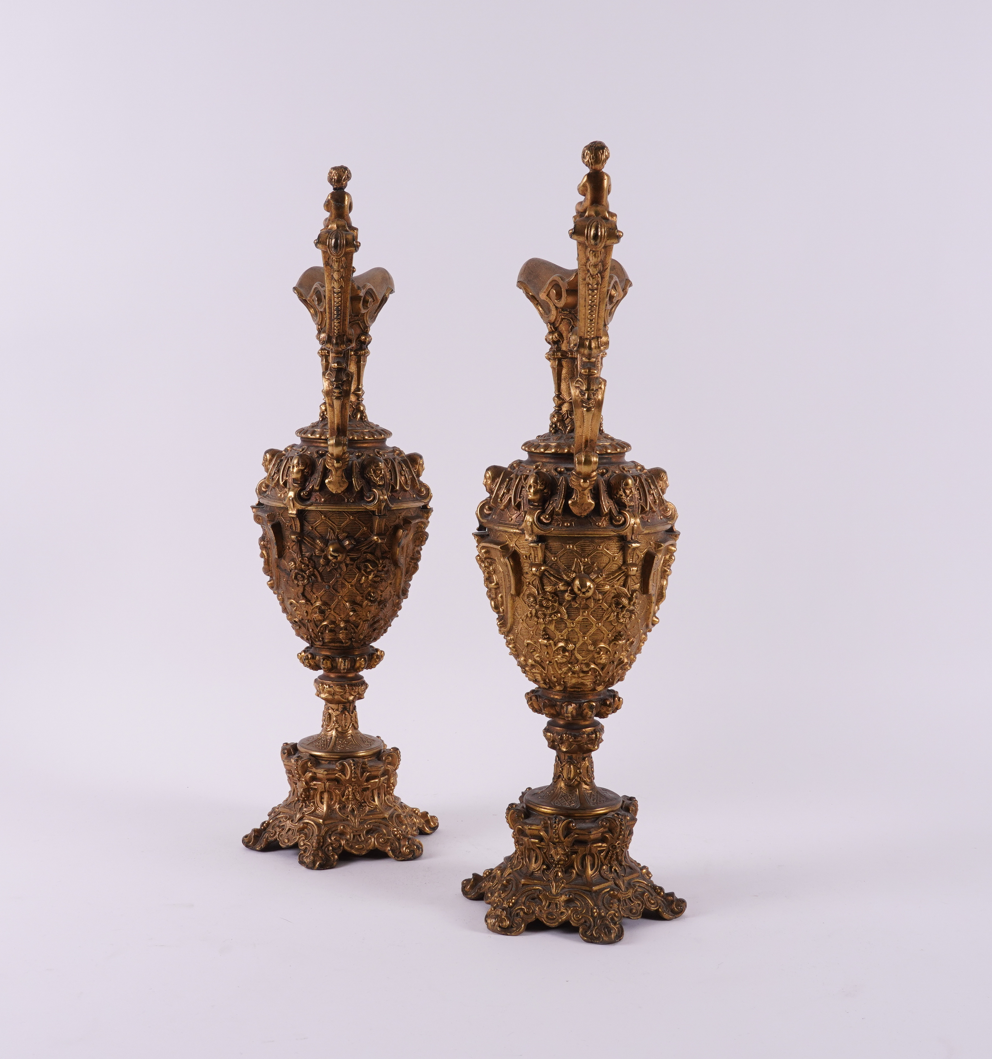 A PAIR OF LATE VICTORIAN GILT-METAL ORNAMENTAL EWERS (2) - Image 4 of 4