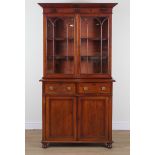 A 19TH CENTURY MAHOGANY BOOKCASE CABINET