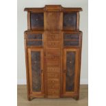 A FRENCH ART NOUVEAU WALNUT AND ROSEWOOD SIDE CABINET
