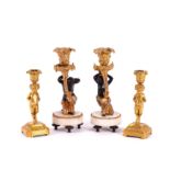 TWO PAIRS OF FRENCH LOUIS XVI STYLE GILT-BRONZE CANDLESTICKS (4)