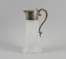 A VICTORIAN SILVER MOUNTED FACETED GLASS CLARET JUG