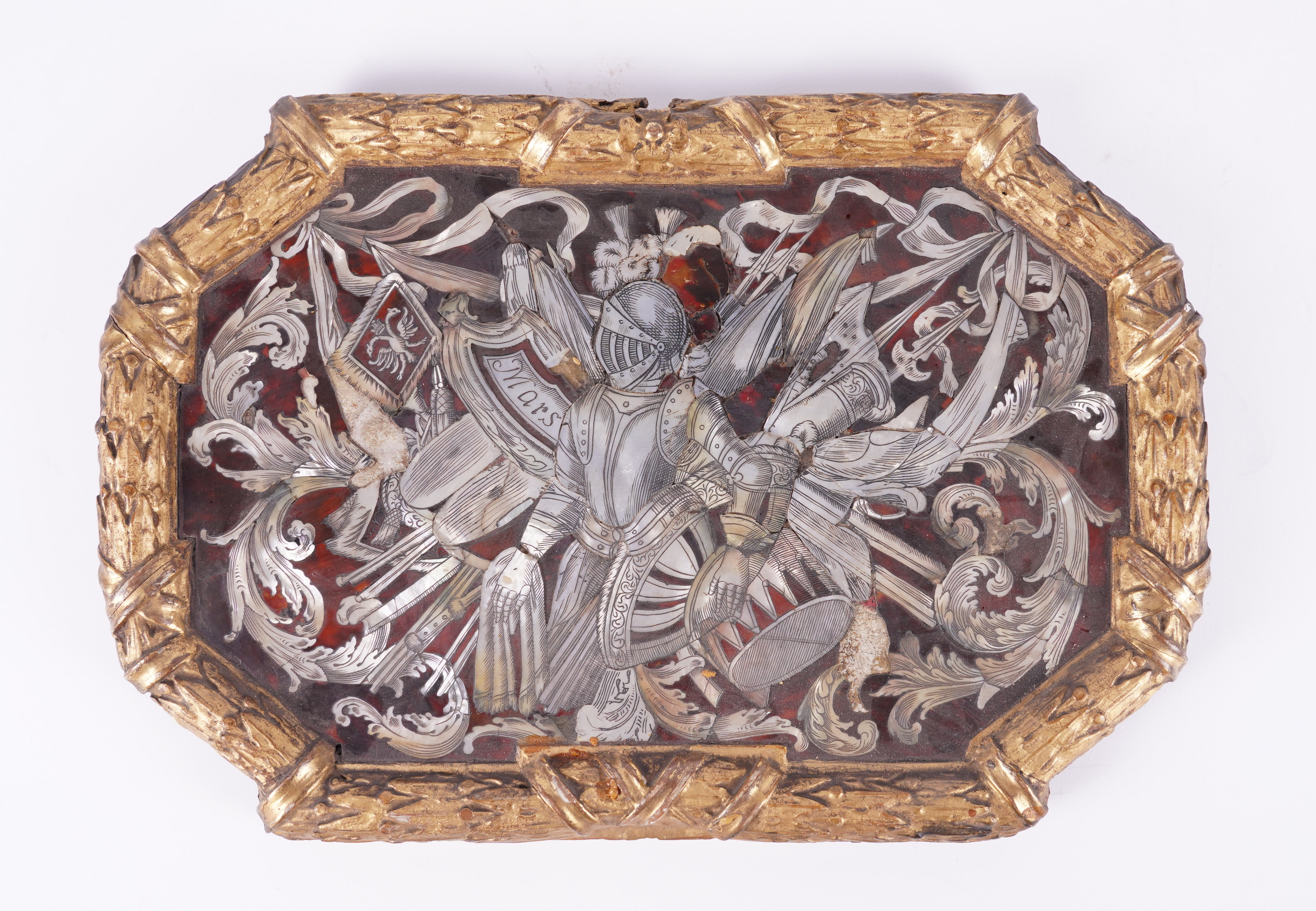 A CONTINENTAL MOTHER-OF-PEARL AND TORTOISESHELL INLAID MILITARY TROPHY PLAQUE