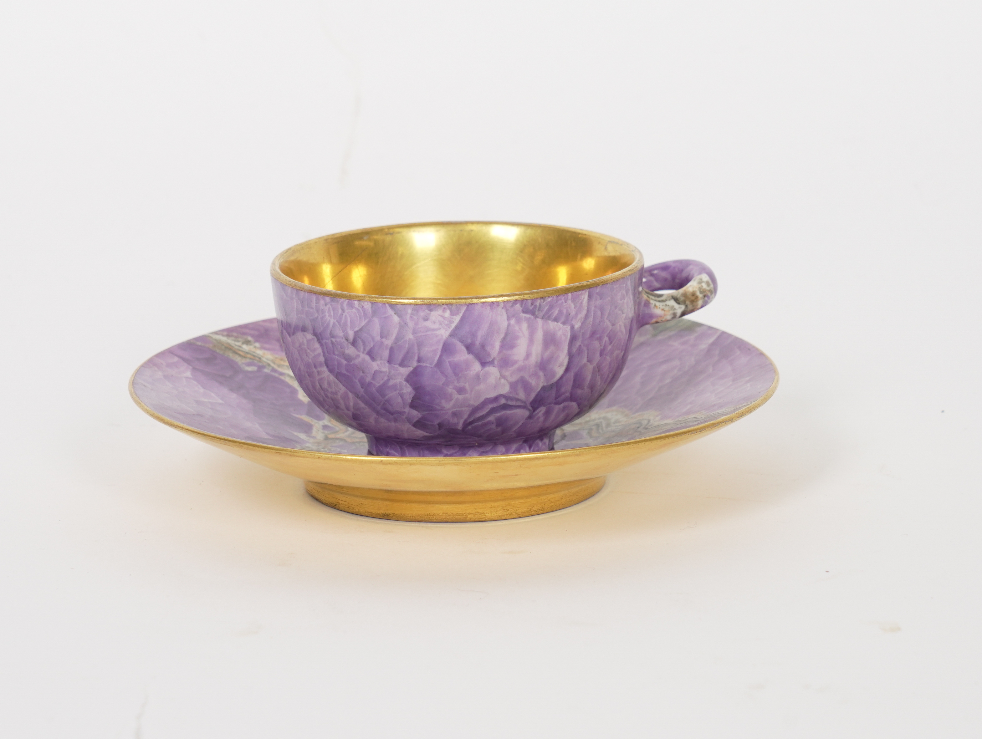 A CONTINENTAL PORCELAIN CUP AND SAUCER (2)