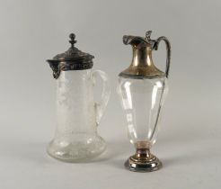 A SILVER MOUNTED GLASS CLARET JUG AND ANOTHER CLARET JUG (2)