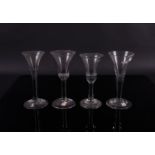 FOUR PLAIN STEMMED WINE GLASSES (4)