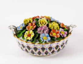 A HEREND TWO-HANDLED CIRCULAR RETICULATED BASKET OF FLOWERS