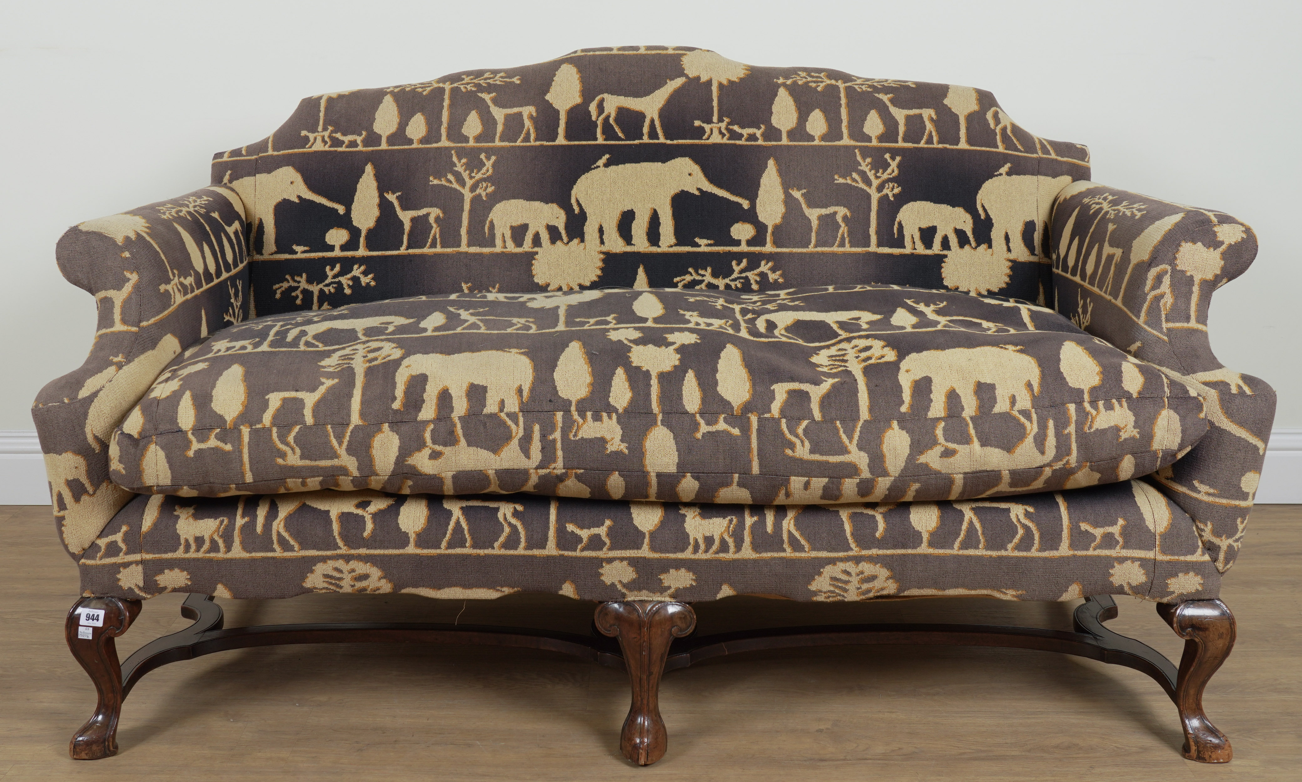 AN EARLY 18TH CENTURY STYLE HUMP BACK SOFA