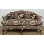 AN EARLY 18TH CENTURY STYLE HUMP BACK SOFA
