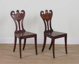 A PAIR OF GEORGE III MAHOGANY HALL CHAIRS (2)